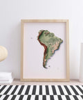 South America, Elevation tint - Geo, 2D printed shaded relief map with 3D effect of South America with geo tint. Shop our beautiful fine art printed maps on supreme Cotton paper. Vintage maps digitally restored and enhanced with a 3D effect. VizCart from Vizart